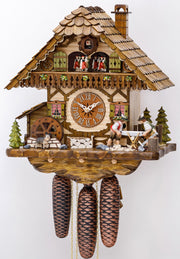 Original 8 Day Cuckoo Clock, Chalet Style, handcarved roof, a nice balcony, trees,  a moving watermill, a dog and two lumberjacks sawing wood